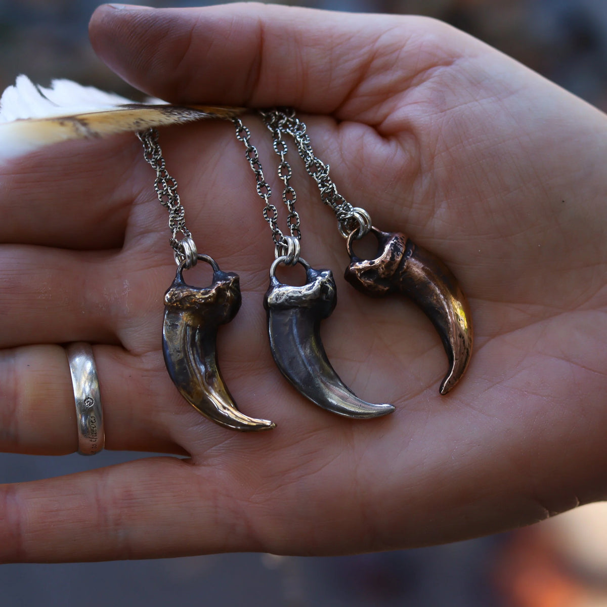 Wolf Claws - Sterling + Bronze Necklaces, lifestyle view