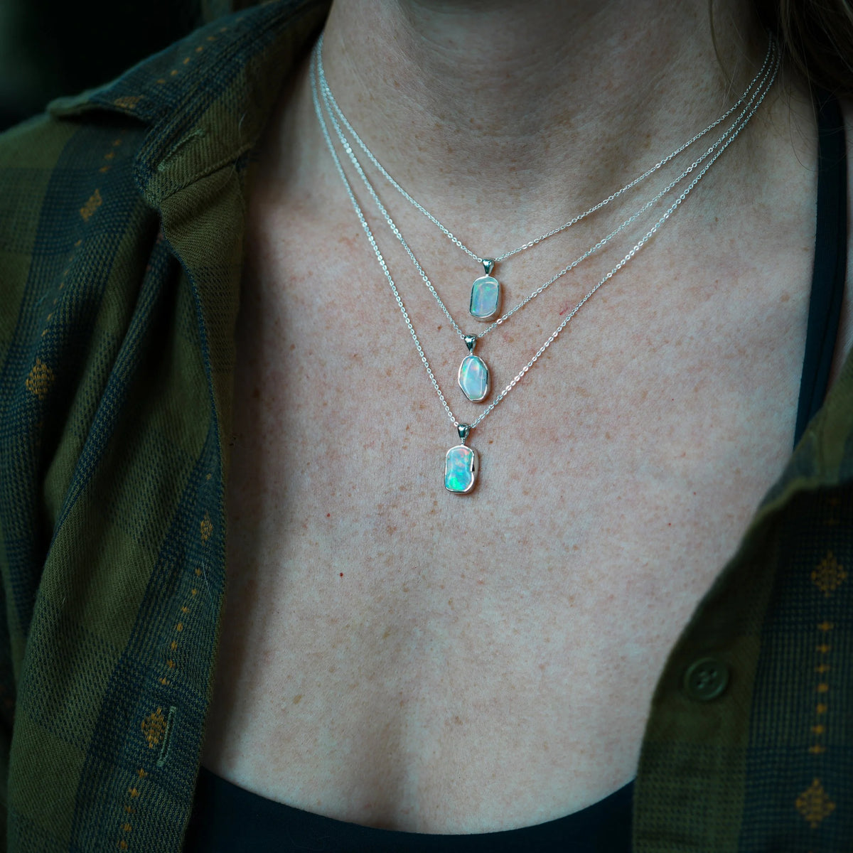 Ghost Ember - Silver wrapped Opal Necklace, lifestyle view