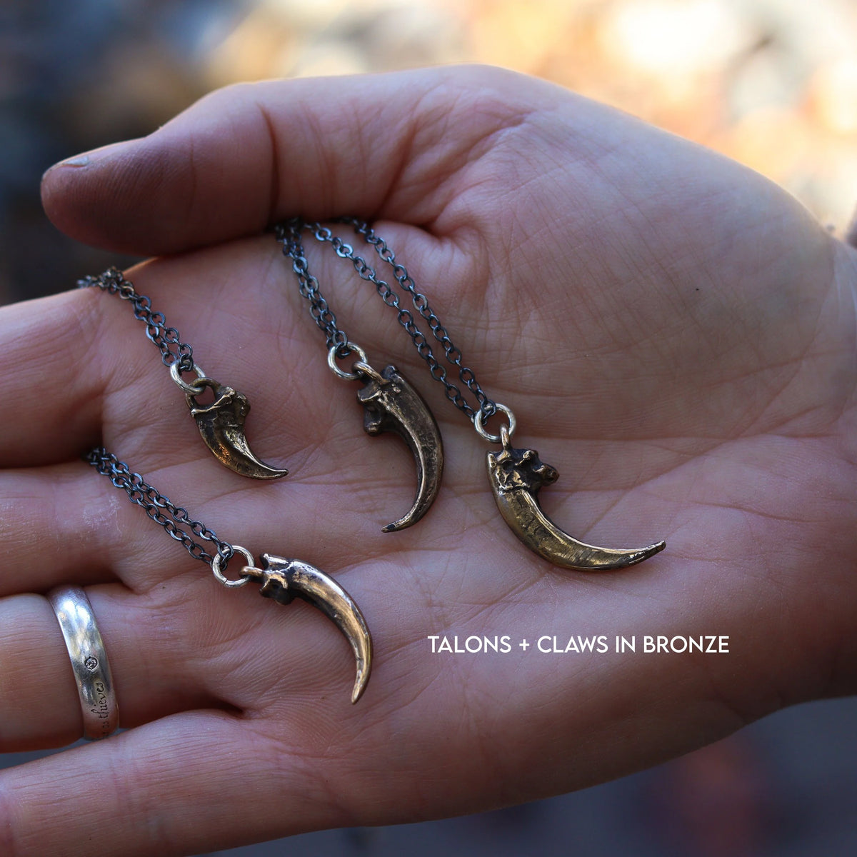 Raccoon claw necklace, side view