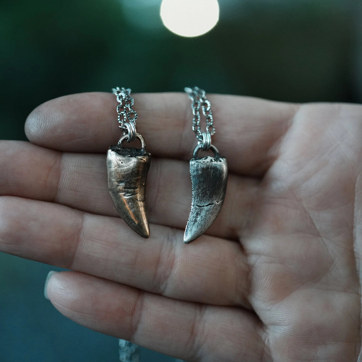 1 Left! Tyrannosaur Tooth Necklace - Bronze or Silver, angled view