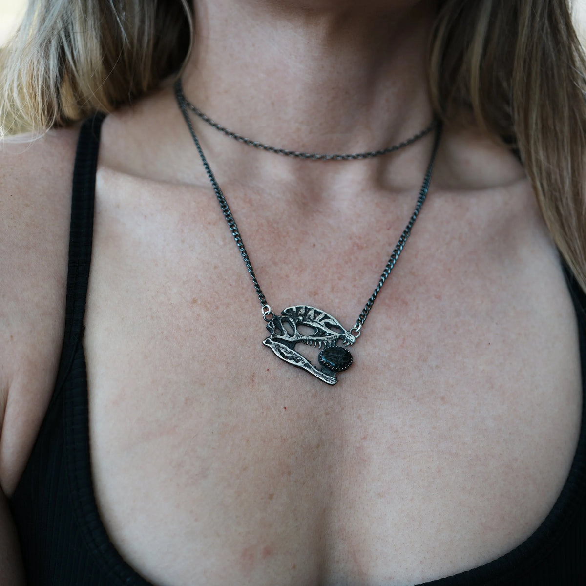 Dilophosaurus Skull - Trilobite Necklace, alternate view